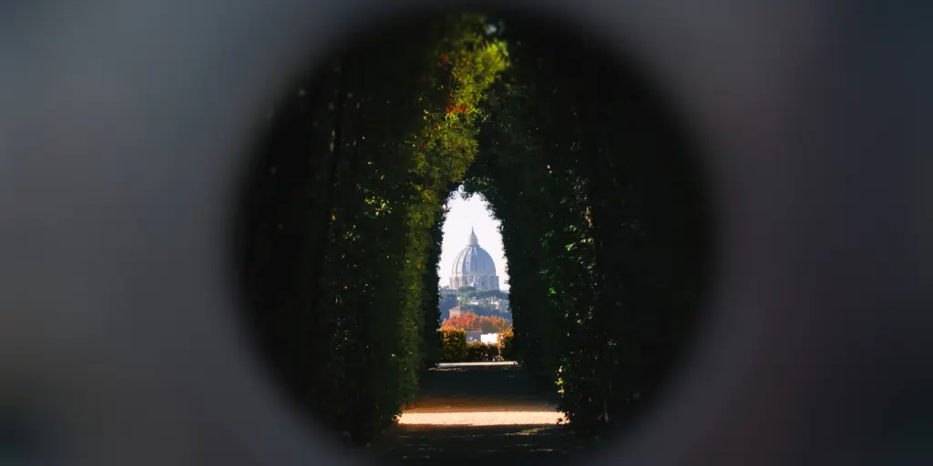 The view of St Peter's Basilica through Aventine Keyhole in Rome 