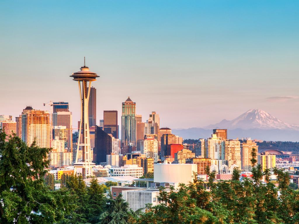 Seattle skyline with a large mountain in the background 