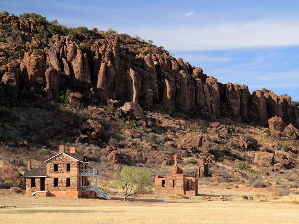 Fort Davis National Historic Site, Home of the Legendary Buffalo Soldiers, Alpine, Texas, USA with voodoos in the distance and buildings in the foreground.