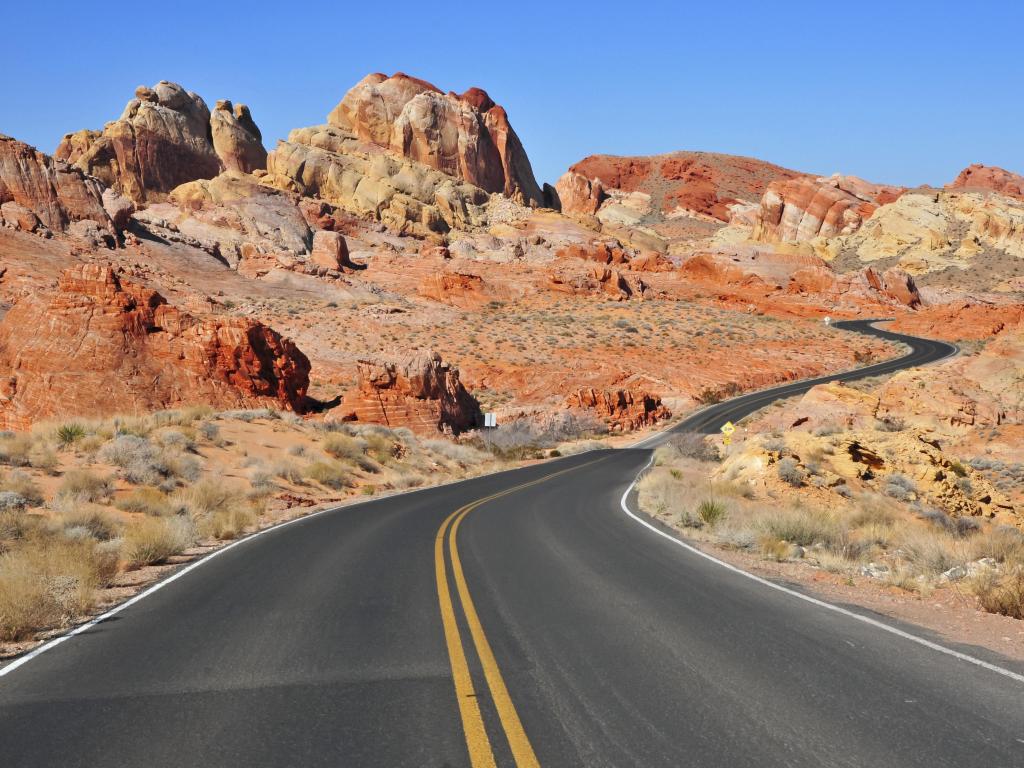 Road winding through red rock desert