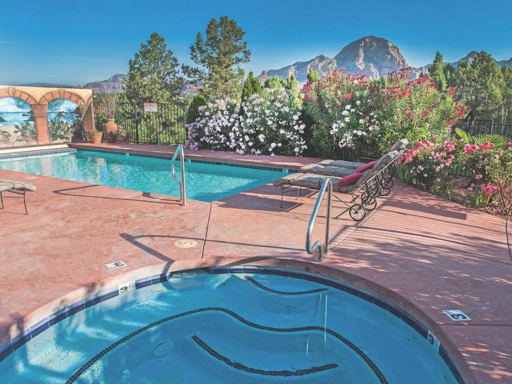 Saltwater outdoor pool and red rock mountain views at A Sunset Chateau