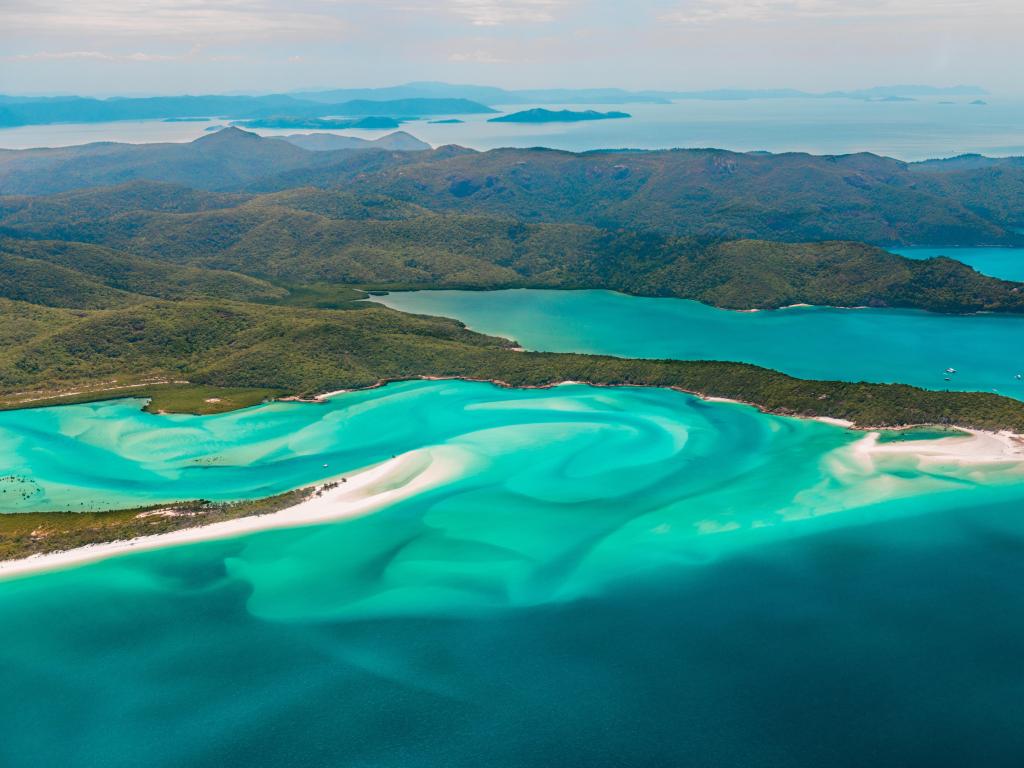 Swirling turquoise waters of Whitehaven Beach on the Whitsundays, Australia