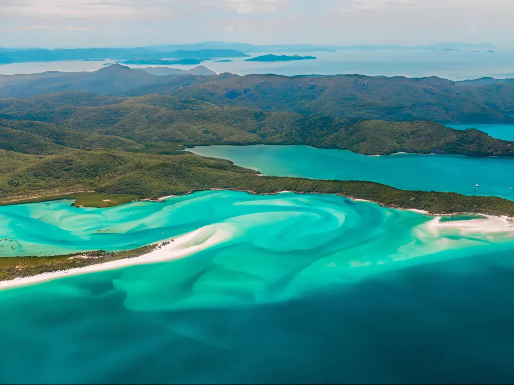 Swirling turquoise waters of Whitehaven Beach on the Whitsundays, Australia