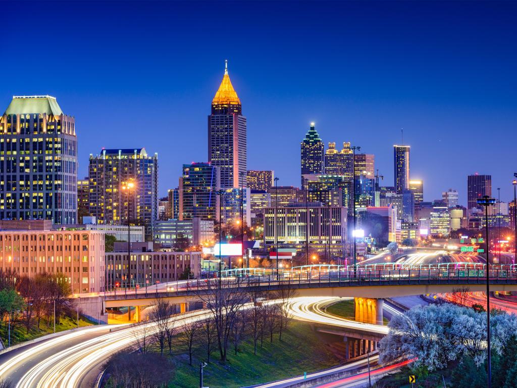 Atlanta, Georgia, USA downtown bright skyline shining in the night sky