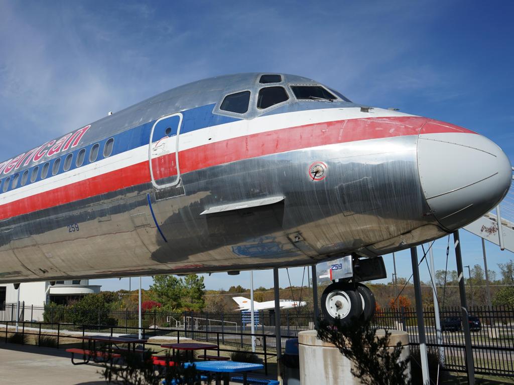 A vintage American Airlines plane on display outside the museum