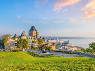 Quebec City, Canada taken as a panoramic view of the city skyline with Saint Lawrence river in Canada at early sunset. 