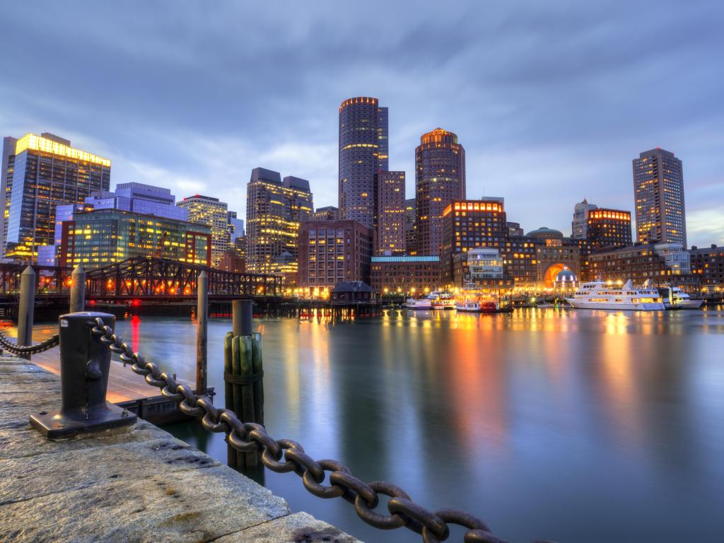 Boston, USA with the city skyline in the background reflecting in the water in the foreground taken at early evening. 