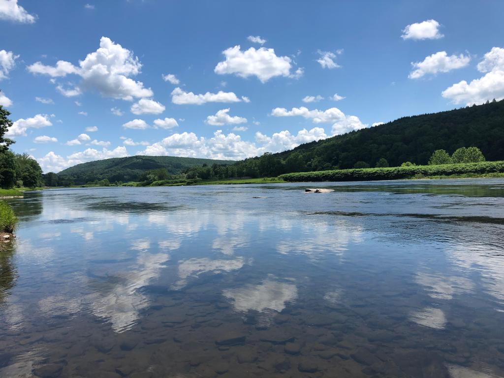 Delaware River in Callicoon, NY, on a partially cloud day.