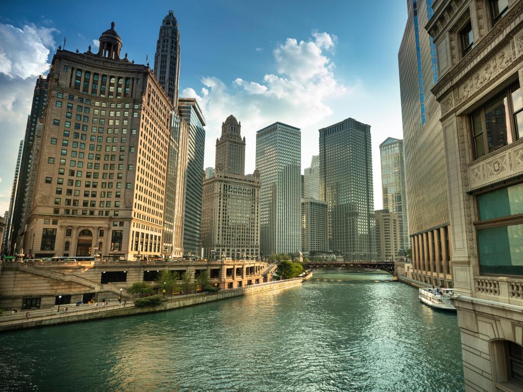 High rise buildings with wide river running between them