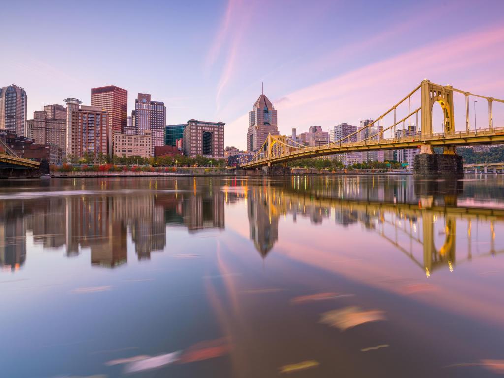 Pittsburgh, Pennsylvania, USA with a panorama of downtown Pittsburgh skyline at twilight.