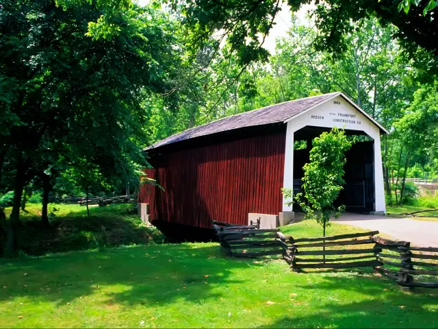 A red-colored covered wood bridge in Parke County, Indiana - Billie Creek Village, Rockville, Indiana