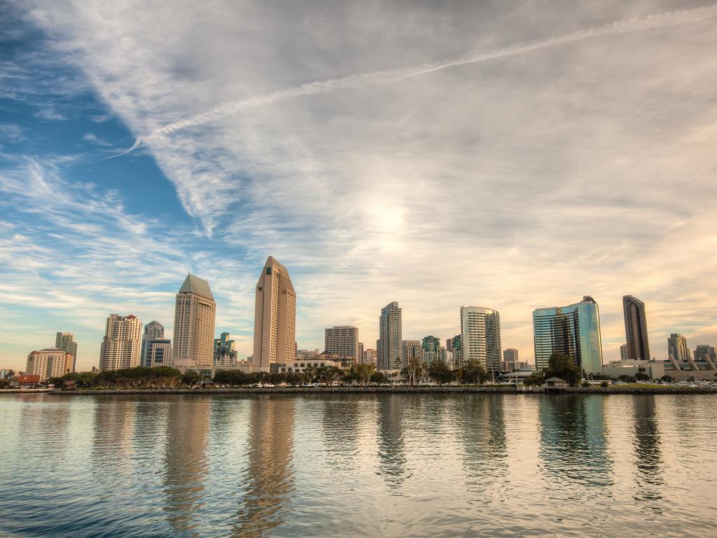 San Diego skyline from across the San Diego Bay on a clear day with light clouds