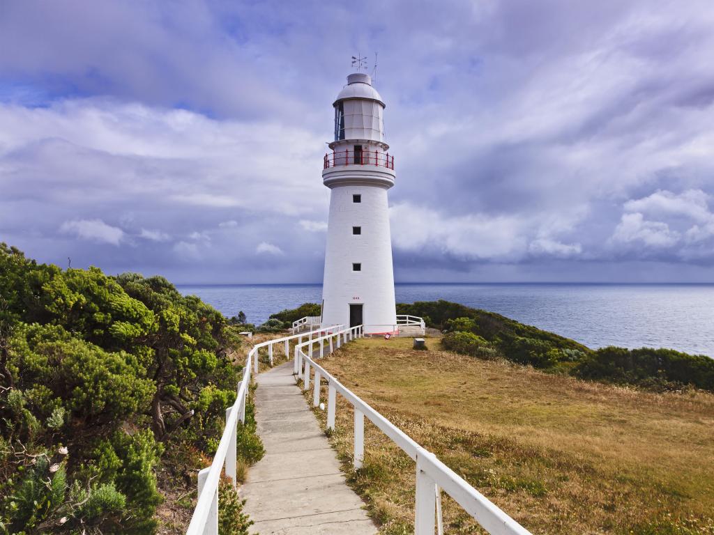 Cape Otway Lightstation, Victoria, Australia near the Great Ocean Road on southern coast against a cloudy sky.