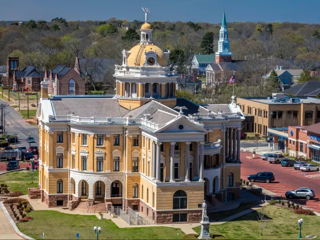 Harrison County Courthouse and a town square in Marshall, Texas