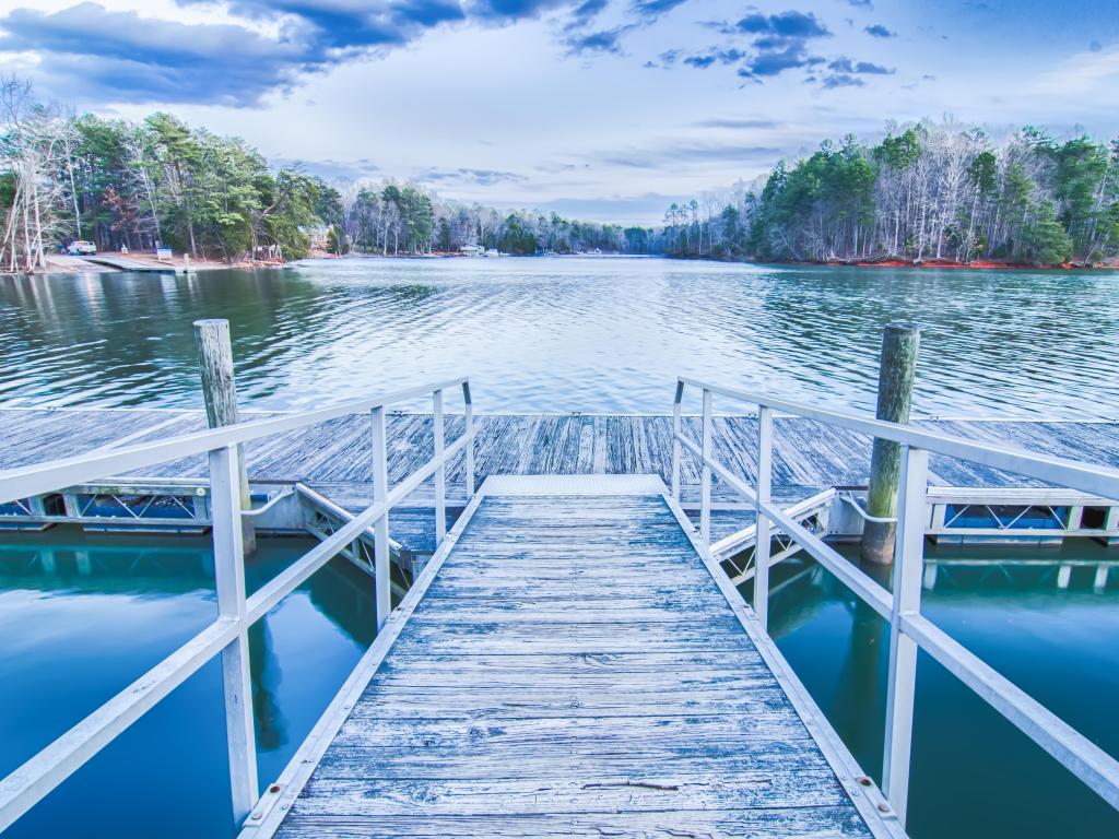 Sunset over Lake Wylie as seen from a white dock jetty