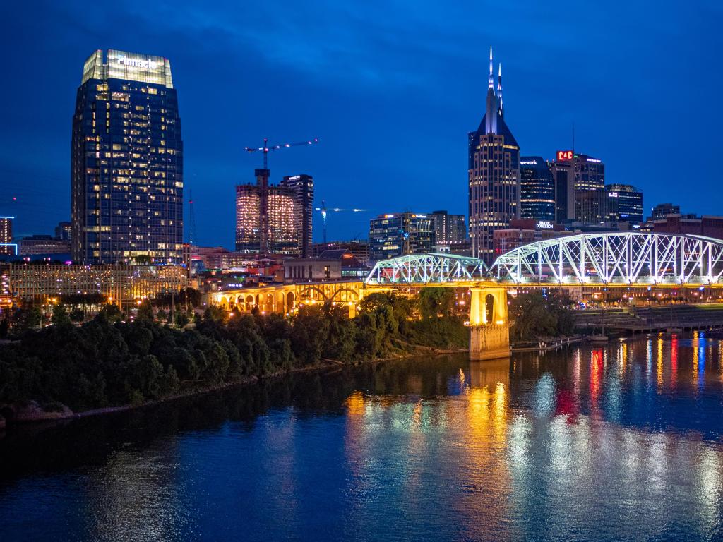 Nashville, Tennessee, USA with a general Jackson Riverboat cruise down the Cumberland River at night.