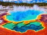 Colorful pool in the national park with smoke rising above it