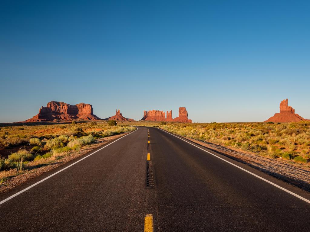 Empty scenic highway in Monument Valley, Arizona, USA