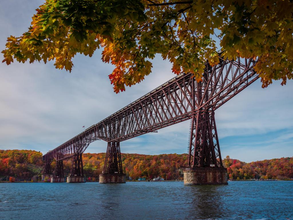 A fall view of Cantilever bridge in Walkway Over the Hudson State Historic Park on a sunny day