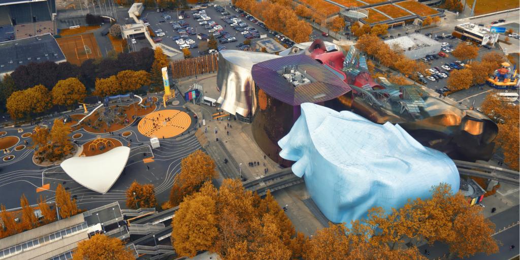 Autumn trees surround the quirky Frank Gehry-designed MoPOP museum in Seattle, Washington