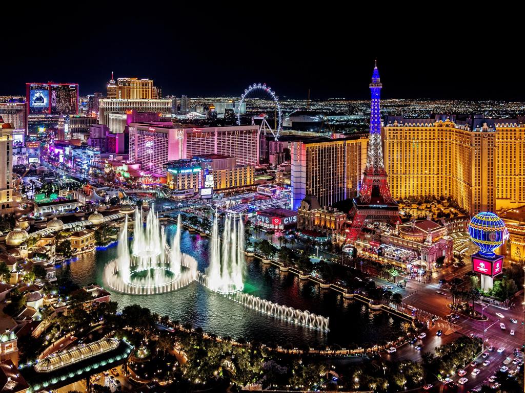 Aerial view of the Las Vegas strip at night, with the bright lights clearly visible
