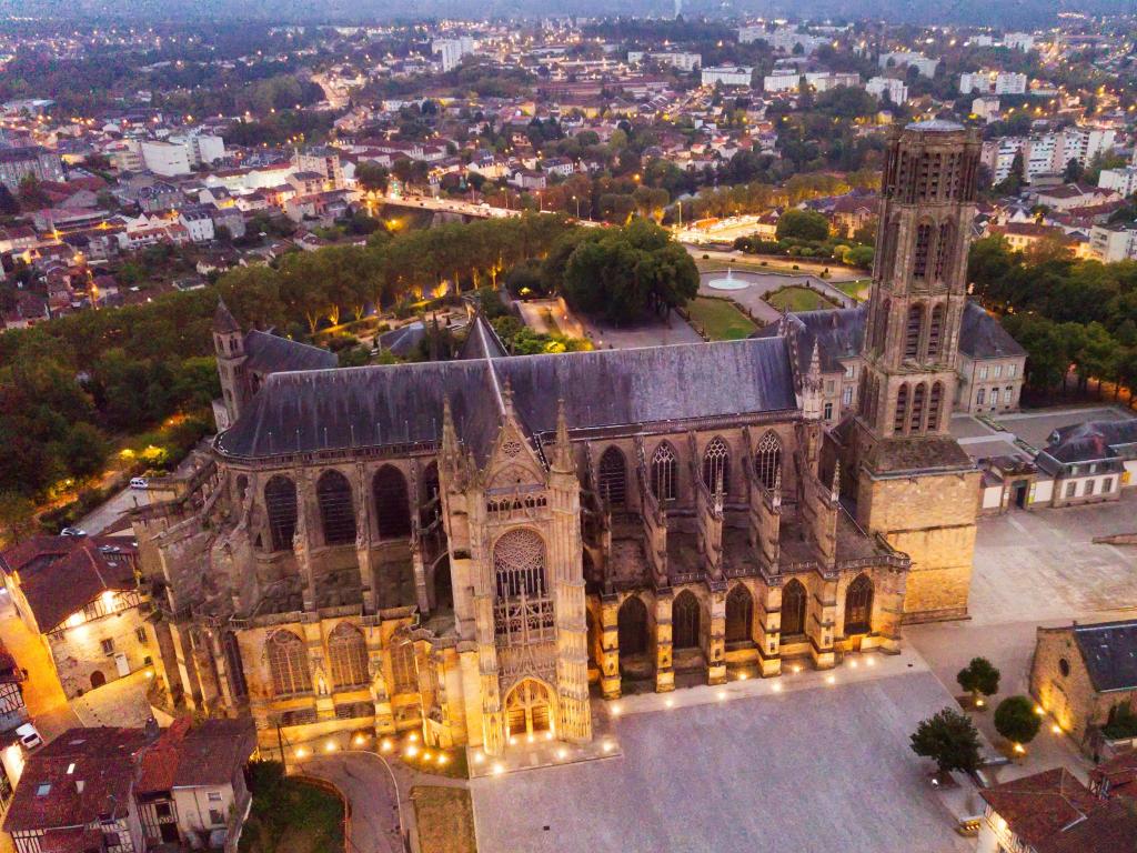 Aerial view of landmark of famous cathedral in Limoges city illuminated at dusk in France