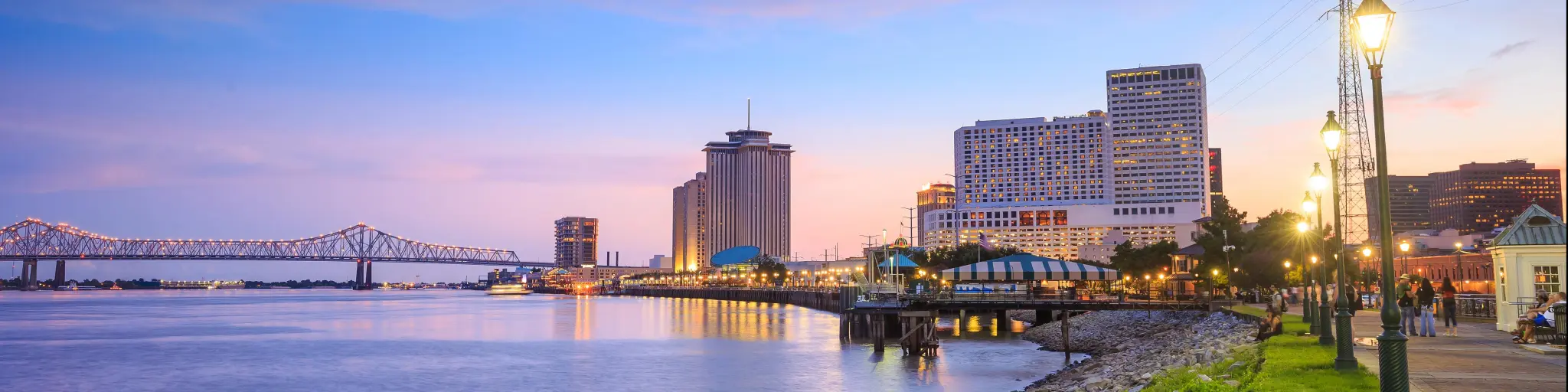 New Orleans, Louisiana, USA taken at the downtown city with the Missisippi River at twilight.