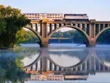  An early morning Virgina Railway Express commuter train passes over the Rappahannock River en route to Washington, D.C.