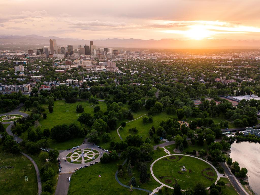 Denver, Colorado, USA with an aerial drone photo of the skyline of Denver at sunset from City Park.