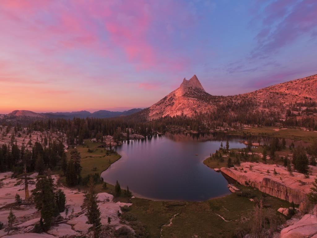 Sunset over Cathedral Peak and Cathedral Lake in Yosemite National Park.
