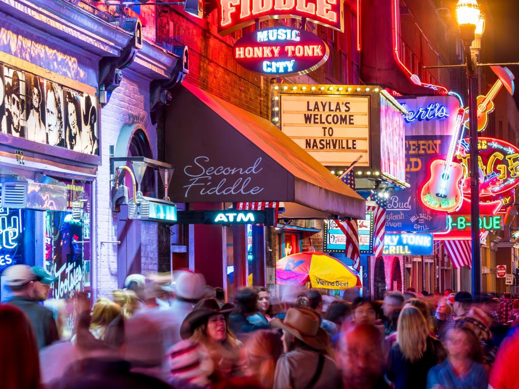 Nashville, Tennessee, USA with neon signs on Lower Broadway Area at night.