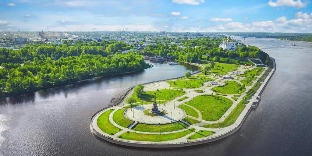 An aerial view of Strelka park jutting out into the water of the Kotorosl and Volga rivers, which meet here. A statue can be seen at the front of the park.