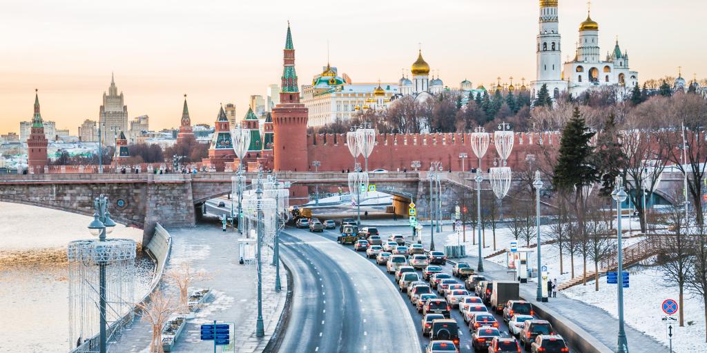 View of traffic stacking up along the Moskvoretskaya embankment, Moscow and, with the river to one side and the Kremlin in the background. 