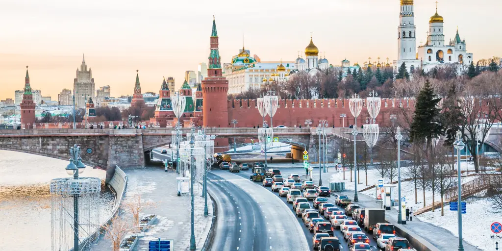 View of traffic stacking up along the Moskvoretskaya embankment, Moscow and, with the river to one side and the Kremlin in the background. 