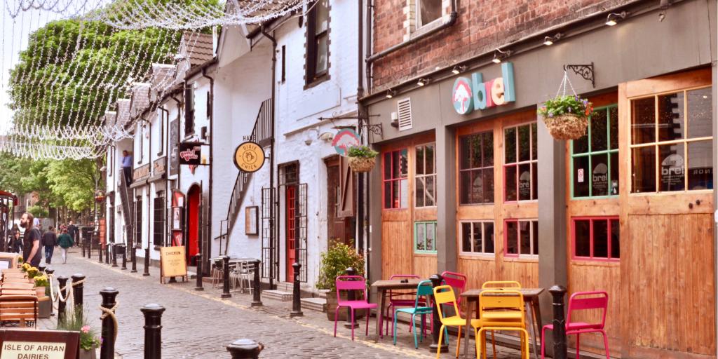 The famous cobbled Ashton Lane in Glasgow is lined with cafes, restaurants and bars