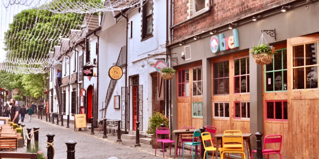 The famous cobbled Ashton Lane in Glasgow is lined with cafes, restaurants and bars
