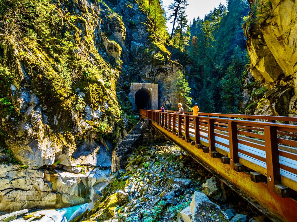 Bridge connecting the Othello Tunnels through rock canyon on a sunny day