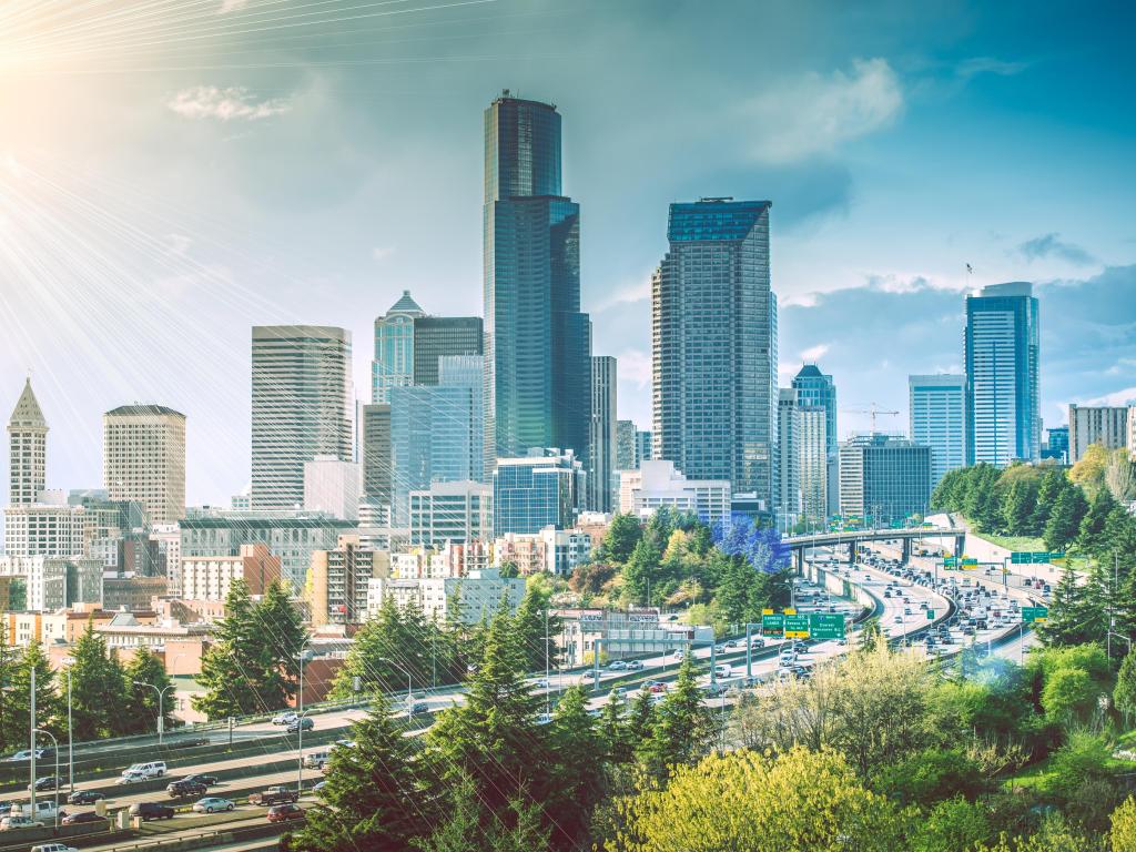 A Sunny Day in Seattle, with the freeway in the foreground and hazy sunshine above