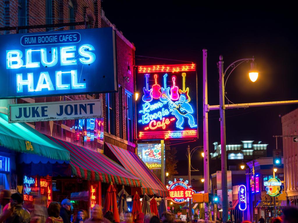 Illuminated signs of famous Blues clubs line Beale Street