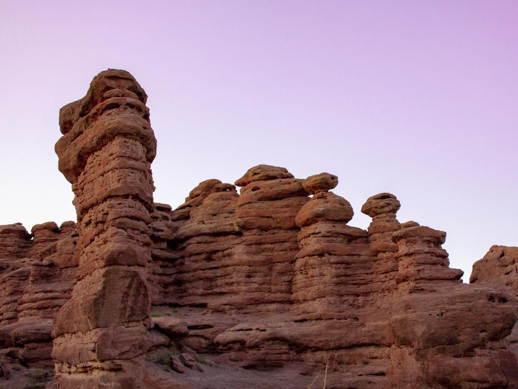 Hoodoo desert rock formations in San Lorenzo Canyon landscape at sunset with a view of the canyon outside of Socorro, New Mexico, USA.