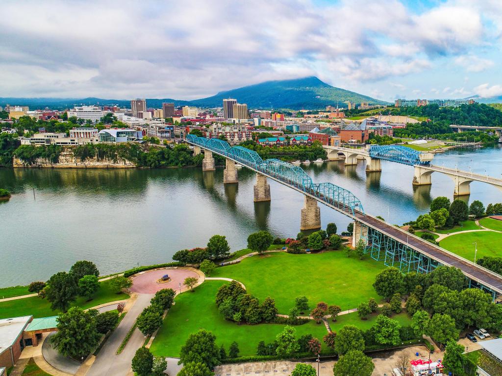 Drone Aerial of Downtown Chattanooga TN Skyline, Coolidge Park and Market Street Bridge.