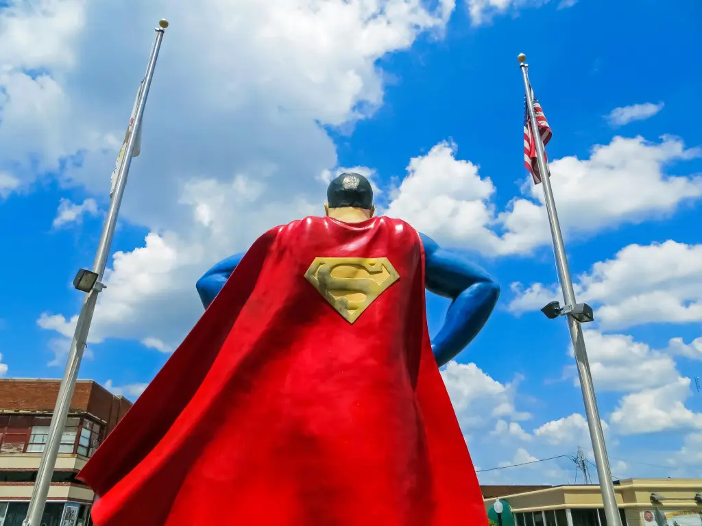 A shot from the back of the Superman Statue in Illinois, highlighting his cape