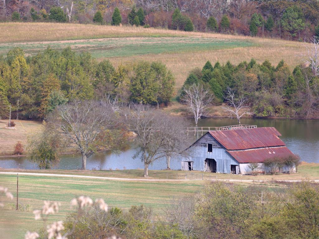 Barn and pond in a valley near the Natchez Trace Parkway in Tennessee