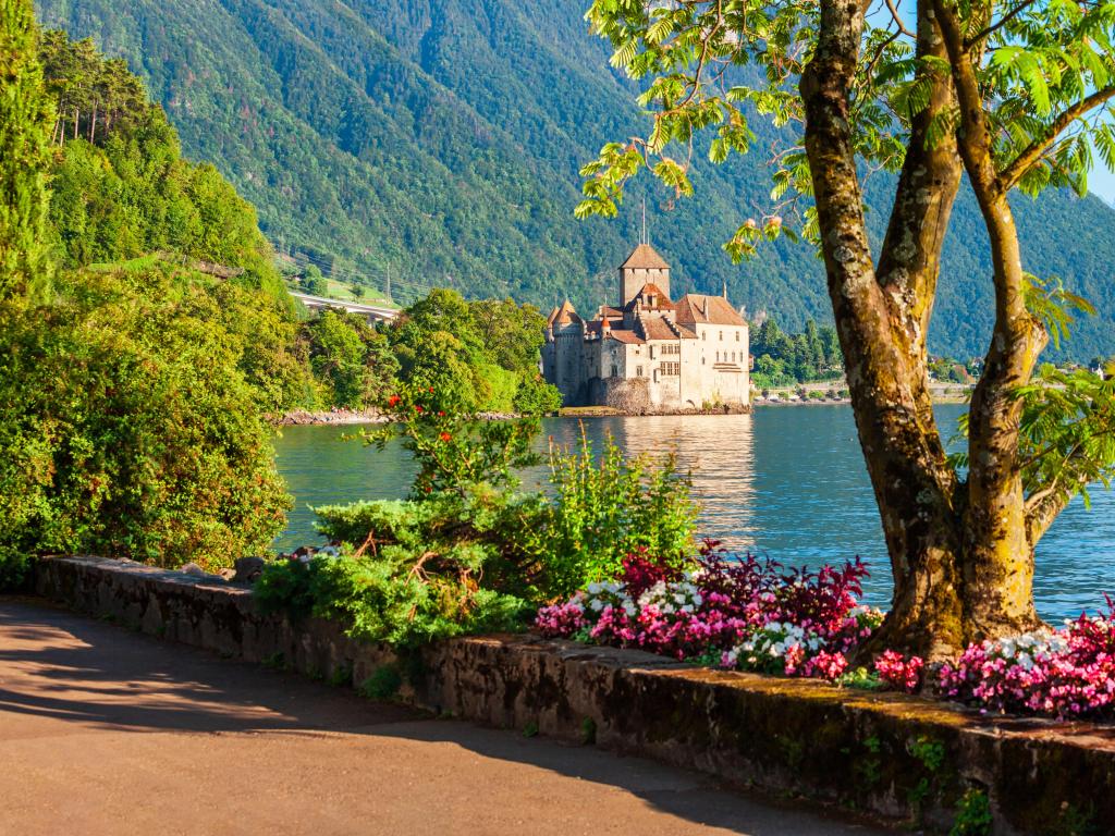 Chillon Castle or Chateau de Chillon is an island castle located on Lake Geneva near Montreux town in Switzerland