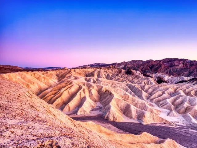 Badlands view from Zabriskie Point in Death Valley National Park at Dusk, California