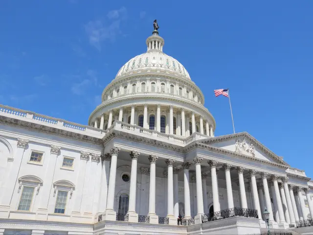 Washington DC, United States landmark. National Capitol building with US flag.