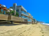 Malibu beach houses on popular Carbon Beach on a summers sunny day