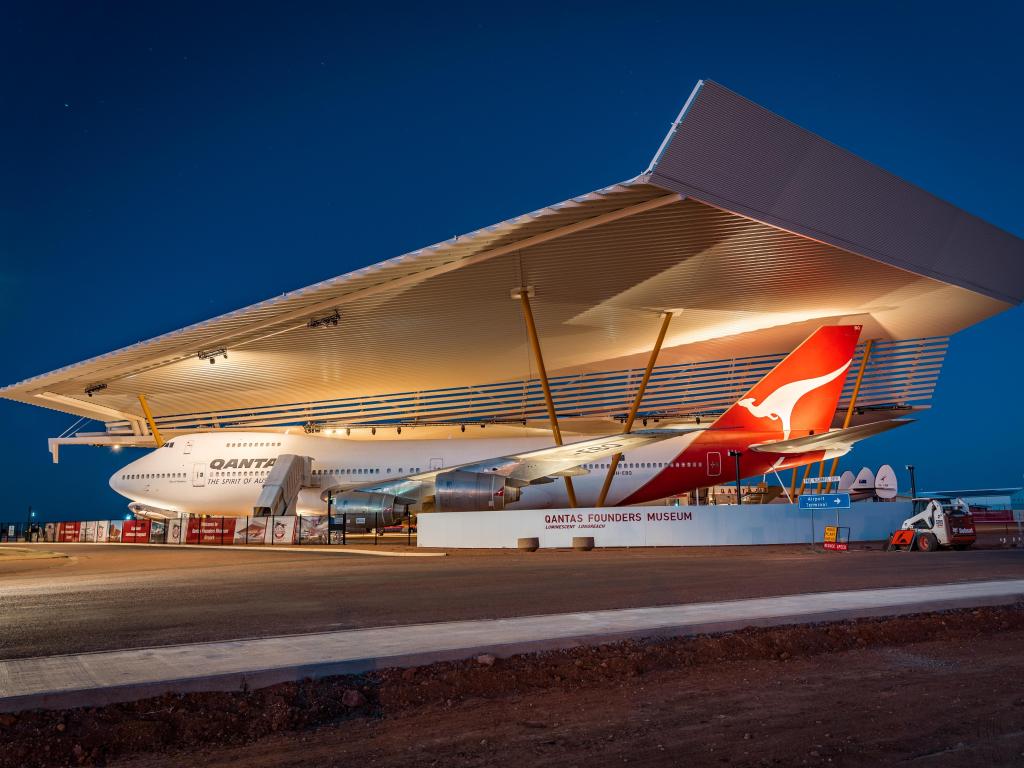 Boeing 747 exhibited outside Qantas Founders museum, photo taken at night