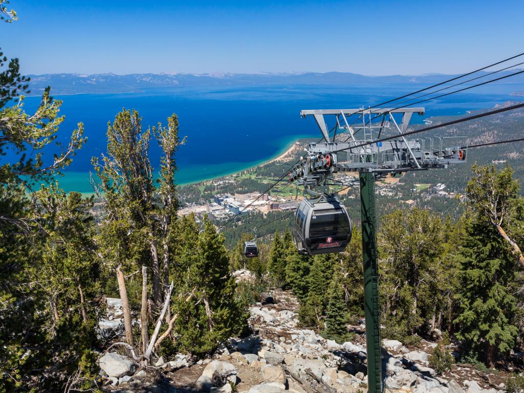 Aerial gondola descending down Lake Tahoe on a sunny day
