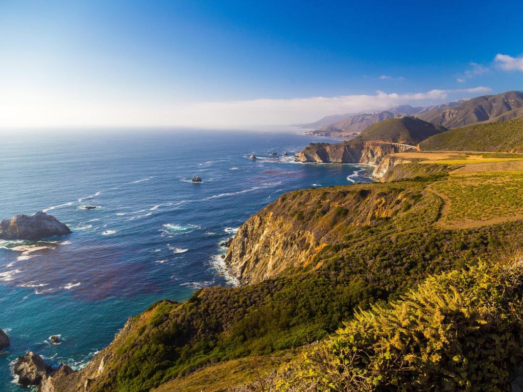 Big Sur, California, USA taken at Bixby Creek Bridge seen along Highway One on a sunny day.